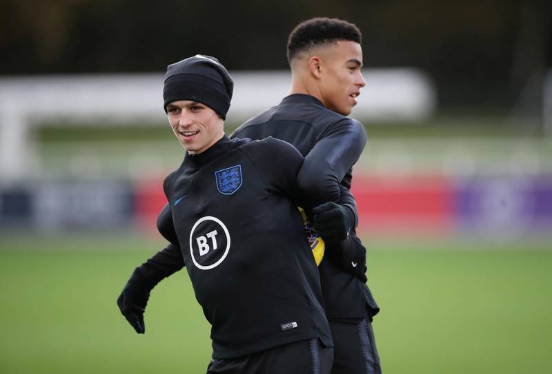 FILE PHOTO: Soccer Football - Euro Under 21 Qualifier - England Under 21 Training - St. George's Park, Burton upon Trent, Britain - November 11, 2019   England's Phil Foden and Mason Greenwood during training   Action Images via Reuters/Carl Recine/File Photo