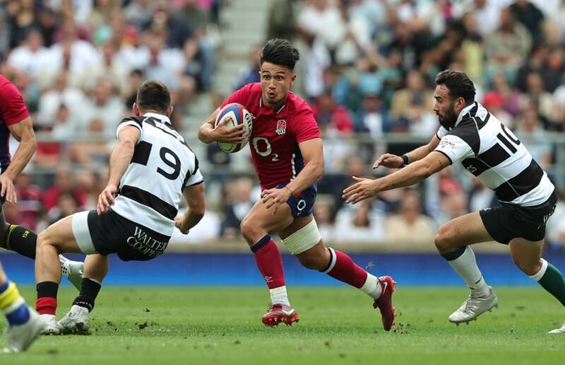 Marcus Smith of England runs with the ball during the International match against Barbarians at Twickenham on June 19, 2022 in London. Getty Images