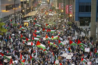 Thousands of pro-Palestinian and Palestinian Americans march towards the Israeli consulate in Chicago during a protest. AP