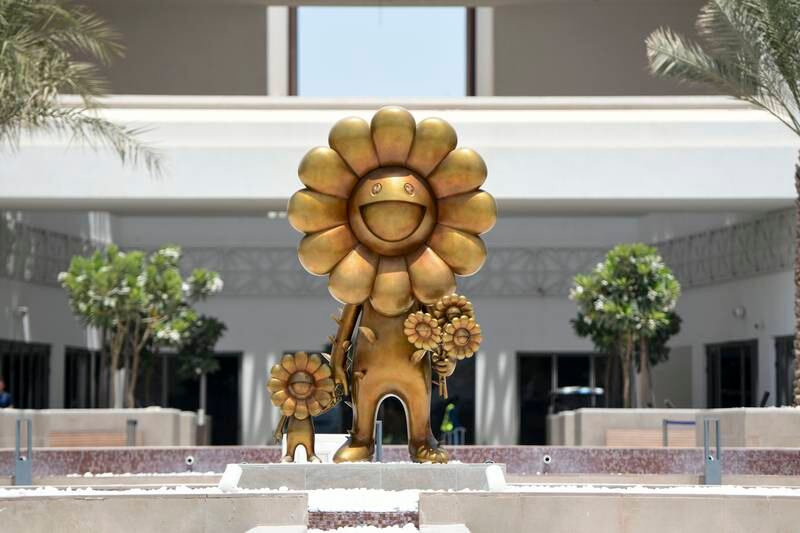 Flower Parent and Child, a sculpture by Takashi Murakami on Yas Bay Waterfront, Abu Dhabi. Khushnum Bhandari / The National
