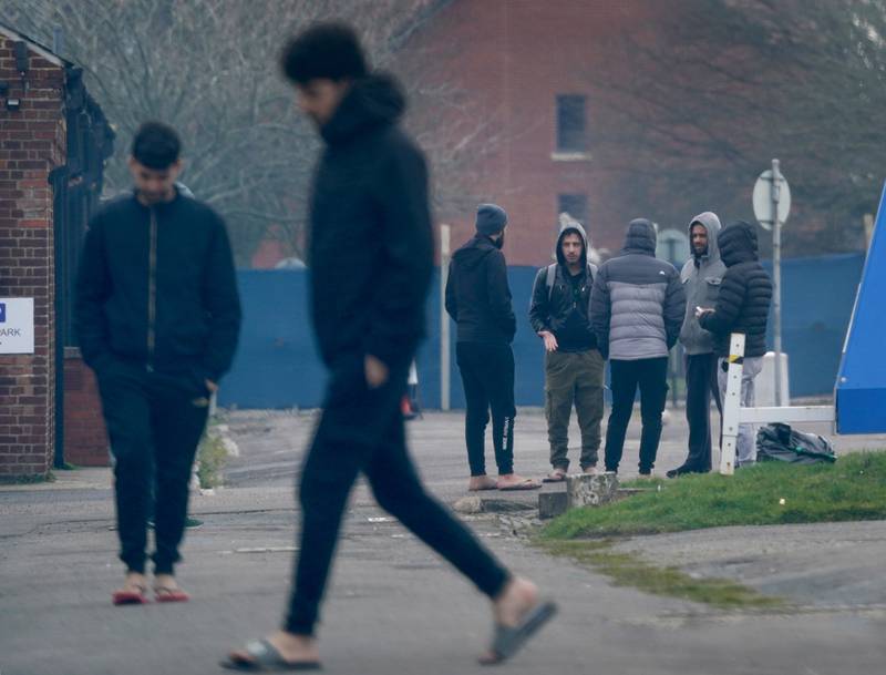 Migrants housed at Napier Barracks in Folkestone, Kent. Almost 3,000 migrants have made unauthorised crossings of the English Channel this year. PA