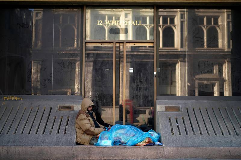 LONDON, ENGLAND - DECEMBER 13:  A homeless man sleeps on the street in central London after one of the coldest nights so far this winter on December 13, 2018 in London, United Kingdom. With temperatures expected to drop below freezing in the capital, Mayor Sadiq Khan announced that cold-weather shelters would be open citywide. A recent report from the housing charity Shelter puts Britain's homeless population at 320,000, a 4% rise over last year, with London having the highest rate. (Photo by Christopher Furlong/Getty Images)