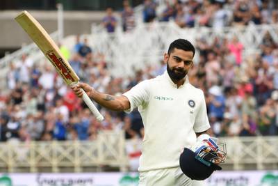 India's captain Virat Kohli salutes the crowd as he leaves the pitch after getting out lbw for 103 runs during the third day of the third Test cricket match between England and India at Trent Bridge in Nottingham, central England on August 20, 2018. (Photo by Paul ELLIS / AFP) / RESTRICTED TO EDITORIAL USE. NO ASSOCIATION WITH DIRECT COMPETITOR OF SPONSOR, PARTNER, OR SUPPLIER OF THE ECB