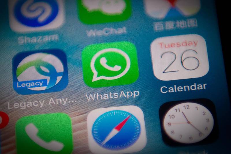 (FILES) In this file photo taken on September 26, 2017, this photo illustration shows the Whatsapp application logo (C) on a smartphone screen in Beijing.  WhatsApp on May 14, 2019 warned users to upgrade the application to plug a security hole that allowed for the injection of sophisticated malware that could be used to spy on journalists, activists and others. / AFP / NICOLAS ASFOURI
