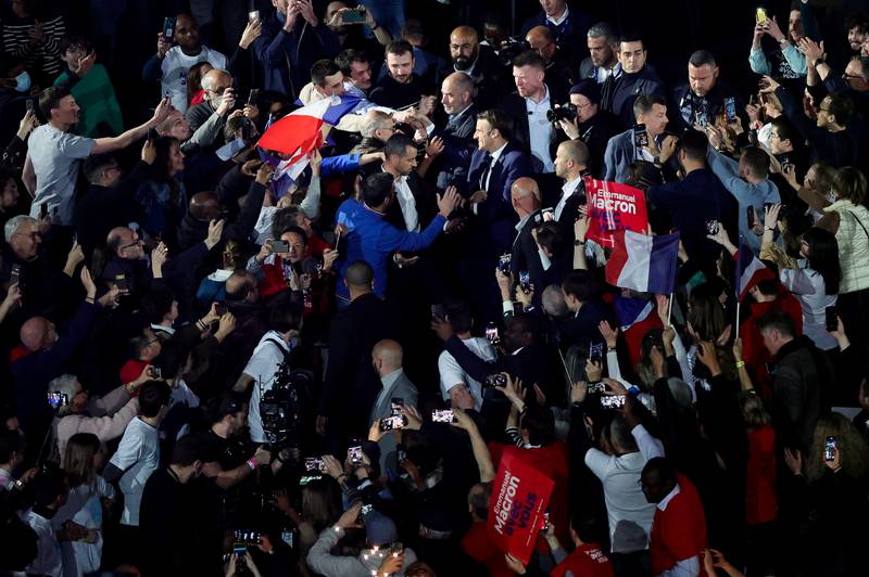French President Emmanuel Macron arrives for his campaign rally at La Defense Arena in Paris. Reuters