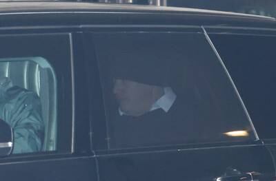 Mr Johnson is driven from Downing Street. Reuters