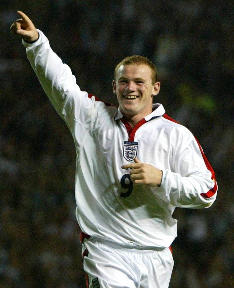England's Wayne Rooney celebrates after scoring his side's second goal against Liechtenstein, during their group seven Euro 2004 qualifier at Old Trafford on September 10, 2003.  PA