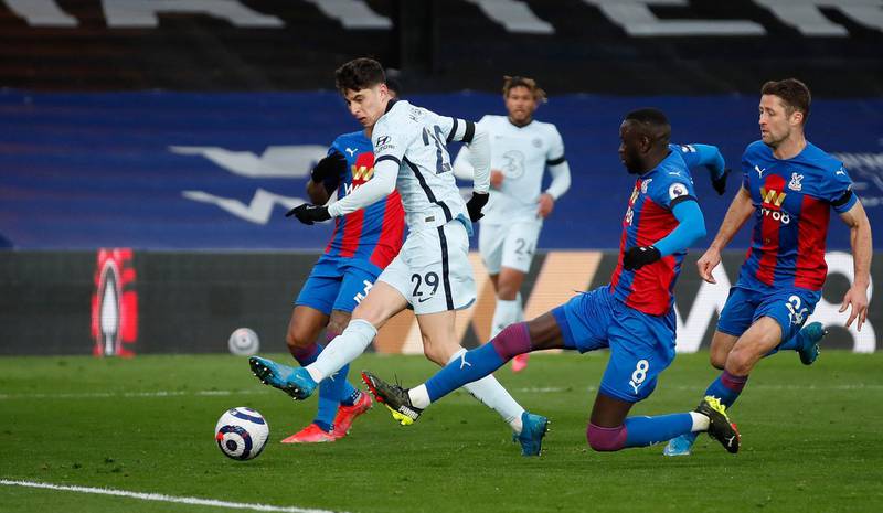 Chelsea's Kai Havertz (left) and Crystal Palace's Cheikhou Kouyate in action during the Premier League match at Selhurst Park, London. Picture date: Saturday April 10, 2021. PA Photo. See PA story SOCCER Palace. Photo credit should read: Peter Cziborra/PA Wire. RESTRICTIONS: EDITORIAL USE ONLY No use with unauthorised audio, video, data, fixture lists, club/league logos or "live" services. Online in-match use limited to 120 images, no video emulation. No use in betting, games or single club/league/player publications.