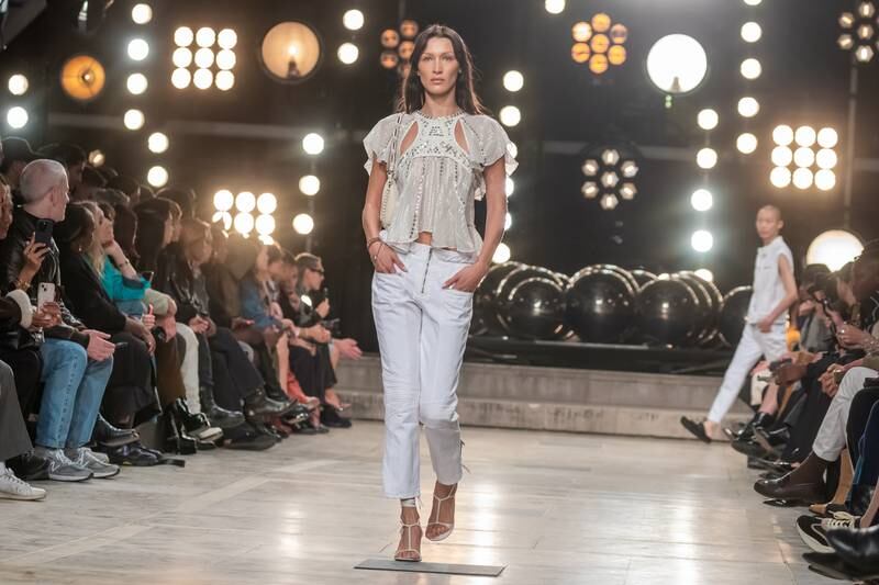 Bella presents a creation from the spring/summer 2023 ready-to-wear collection by French designer Isabel Marant at Paris Fashion Week. EPA