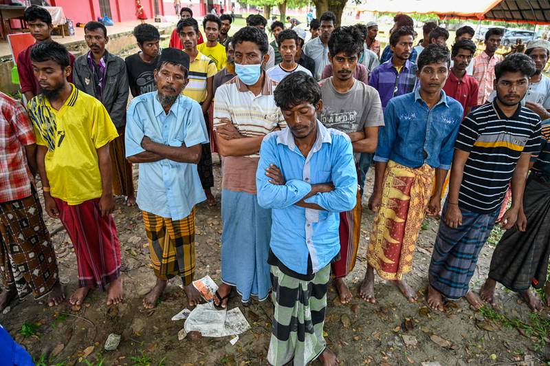 Rohingya refugees gather for identity checks in Laweueng, Indonesia. AFP