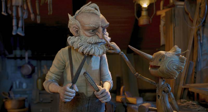 Geppetto, voiced by David Bradley, left, and Pinocchio, voiced by Gregory Mann, in a scene from Guillermo del Toro's Pinocchio. Photo: Netflix