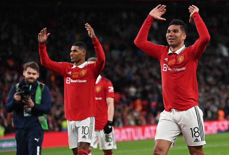 Manchester United's Marcus Rashford and Casemiro celebrate their victory. AFP