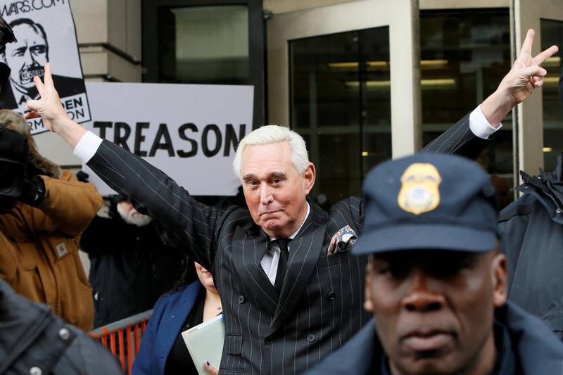 FILE PHOTO: Roger Stone, longtime political ally of U.S. President Donald Trump, flashes a victory gesture as he departs following a status conference in the criminal case against him brought by Special Counsel Robert Mueller at U.S. District Court in Washington, U.S., February 1, 2019. REUTERS/Jim Bourg/File Photo