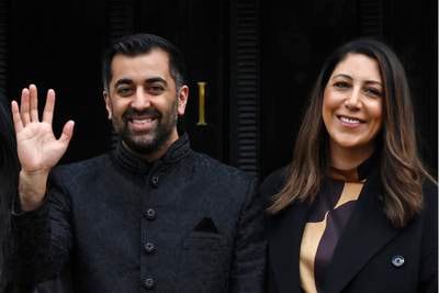 Scottish First Minister Humza Yousaf, pictured with his wife Nadia El-Nakla, said he feels "completely powerless" to help his in-laws. Getty Images