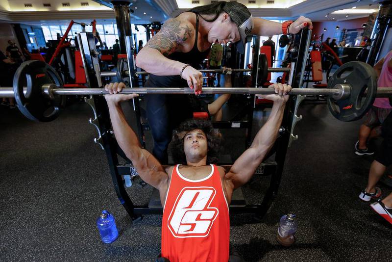 Ali Omar, a Dubai-based young bodybuilder working out at the HQ Fitness Gym with his coach. Victor Besa For The National