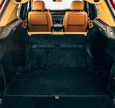 The electrically folding rear seats don’t lie flat, but the boot floor rises to create a seamless ramp to the front seats. Rolls-Royce