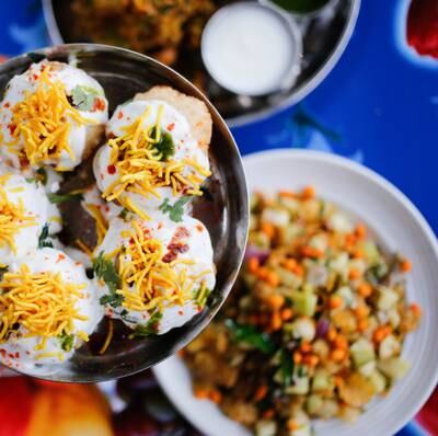 Colourful dishes served at Chai Pani include sev potato dahi puri and more. Photo: Jack Sorokin