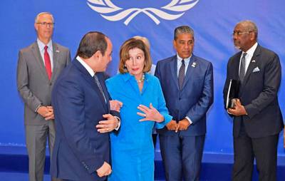 Egypt's President Abdel Fattah El Sisi speaks to US House Speaker Nancy Pelosi at the climate summit. AFP