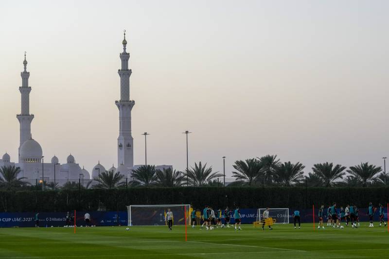 With the Sheikh Zayed Grand Mosque in the background, Chelsea players take part in a training session in Abu Dhabi. AP