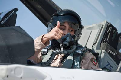 A thumbs-up to the ground crew and it's all systems go for Major Mariam Al Mansouri, the first female Emirati Air Force pilot. Wam