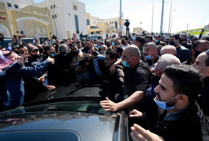 Angry people gather outside Al-Hussein Al Salt Hospital in Salt, Jordan. AP Photo