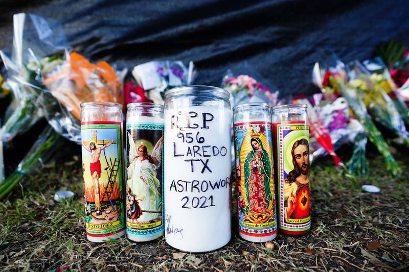 Candles are seen outside the venue of the canceled Astroworld festival.  AFP