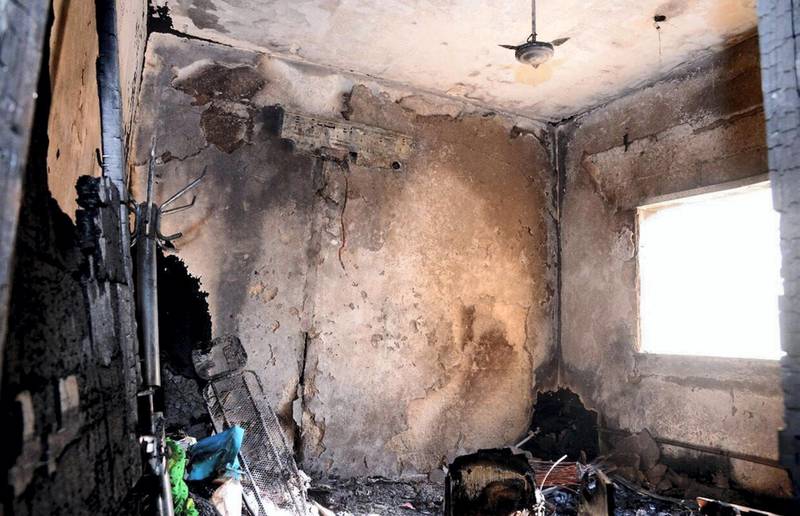 The fire tore through at least two apartments, including this one, killing five people in total. A further six residents and ten emergency service personnel were taken to hospital. Courtesy Sharjah Civil Defence