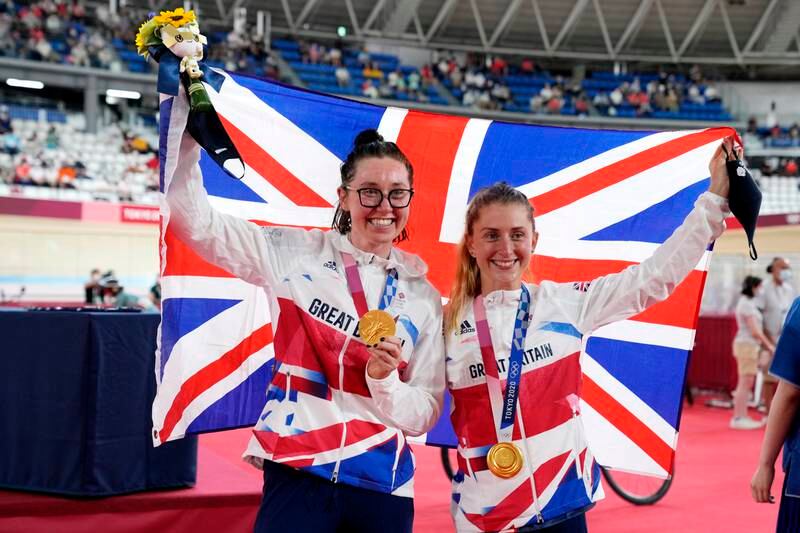 Gold medalists Laura Kenny, right, and Katie Archibald of Great Britain pose with their medals after the women's madison final. EPA