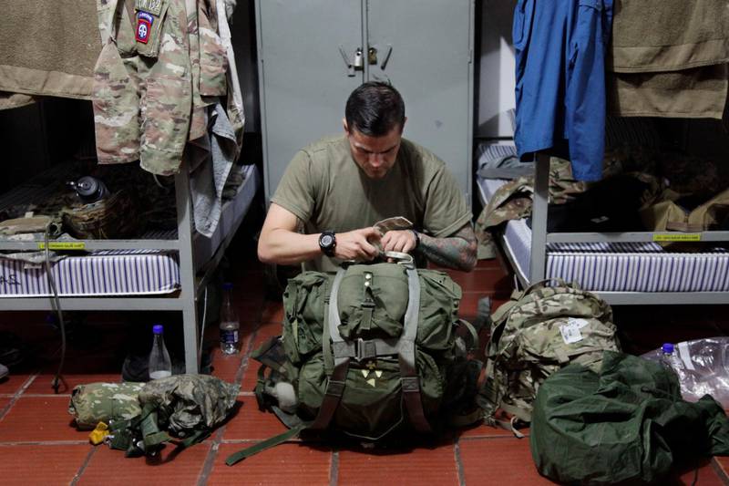US Army Sgt Juan Dominguez prepares his rucksack inside the barracks on Tolemaida Air Base in Colombia. AP