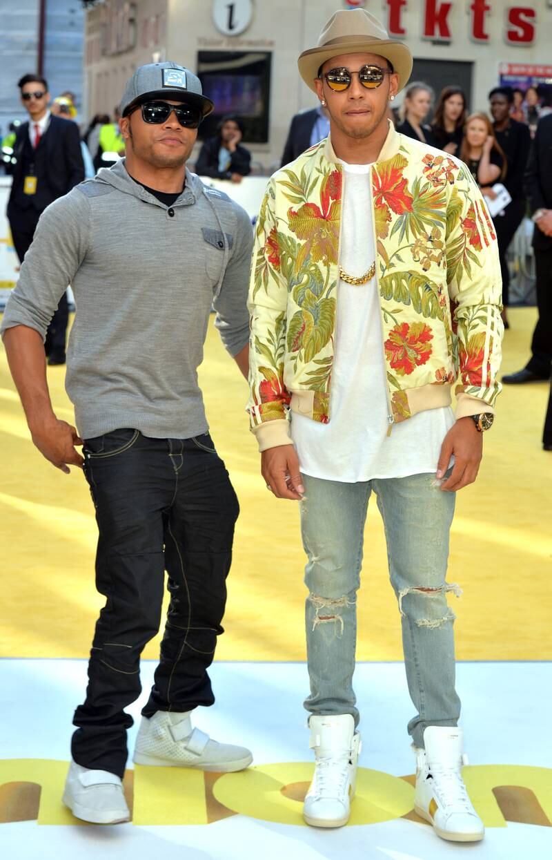 Nicolas Hamilton and Lewis Hamilton, in a yellow tropical print bomber jacket and jeans, attend the premiere of 'Minions' at Odeon Leicester Square on June 11, 2015, in London. Getty Images