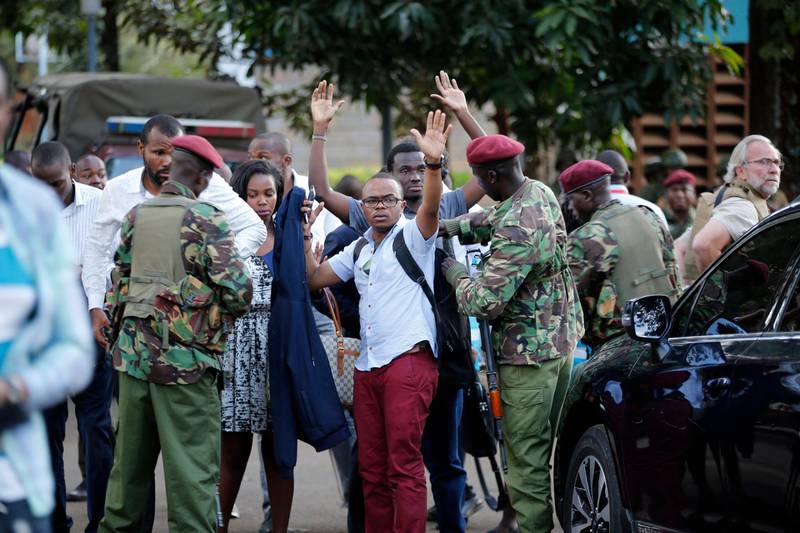 Kenyan armed forces rescue people after an attack on a hotel, in Nairobi, Kenya. Extremists launched a deadly attack on a luxury hotel in Kenya's capital Tuesday, sending people fleeing in panic as explosions and heavy gunfire reverberated through the complex. A police officer said he saw bodies, "but there was no time to count the dead." AP Photo