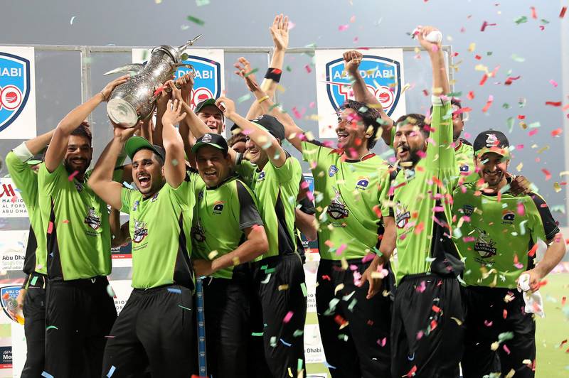 ABU DHABI , UNITED ARAB EMIRATES, October 06 , 2018 :- Players of Lahore Qalanders celebrating with the trophy after winning  the Final of Abu Dhabi T20 cricket match between Lahore Qalanders vs Multiply Titans held at Zayed Cricket Stadium in Abu Dhabi. ( Pawan Singh / The National )  For Sports/News/Instagram/Online. Story by Amith
