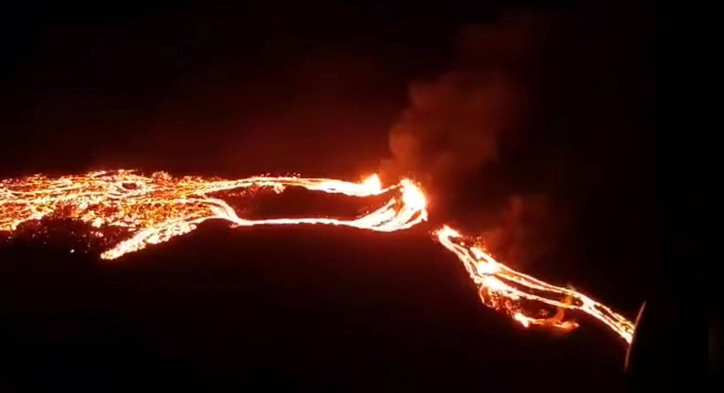 Lava streams are seen during a volcanic eruption in Fagradalsfjall, Reykjanes, Iceland, March 19, 2021 in this still image taken from video provided on social media. Mandatory credit Icelandic Meteorological Office ? IMO/via REUTERS. ATTENTION EDITORS - THIS IMAGE HAS BEEN SUPPLIED BY A THIRD PARTY. MANDATORY CREDIT. NO RESALES. NO ARCHIVES.