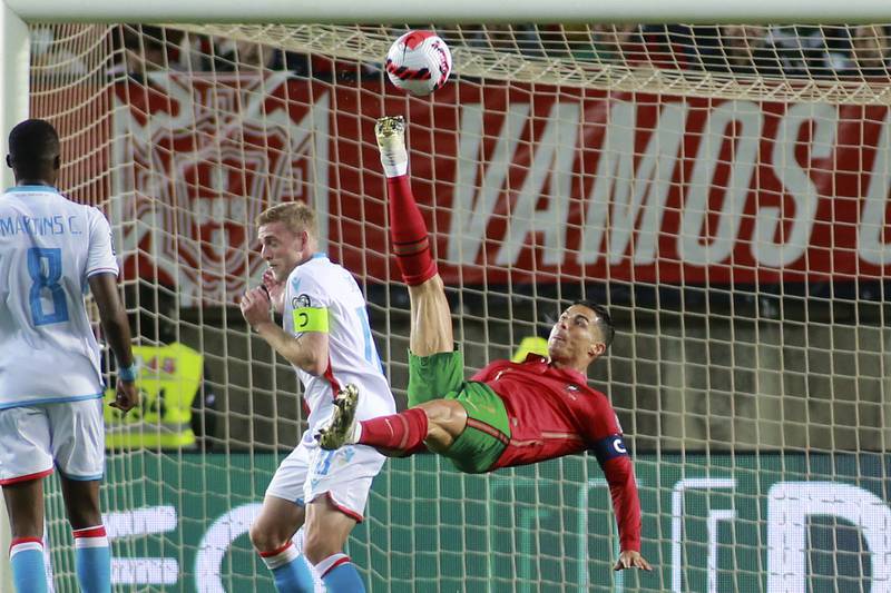 Portugal's Cristiano Ronaldo attempts to score with an overhead kick. AP Photo