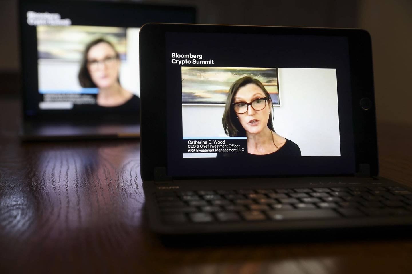 Catherine Wood, chief executive officer of ARK Investment Management LLC, speaks virtually during the Bloomberg Crypto Summit on a laptop computer in Tiskilwa, Illinois, U.S., on Thursday, Feb. 25, 2021. With Bitcoin reaching its all-time highs and interest in cryptocurrencies surging from major banks and asset managers, the future of digital assets has rarely seemed brighter. Photographer: Daniel Acker/Bloomberg