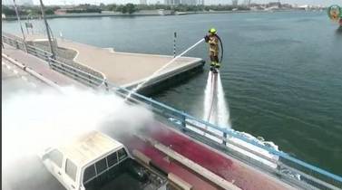 Dolphin, a jetski equipped with a water jetpack and fire hose, will let civil defence tackle fires from the water. Courtesy Dubai Media Office