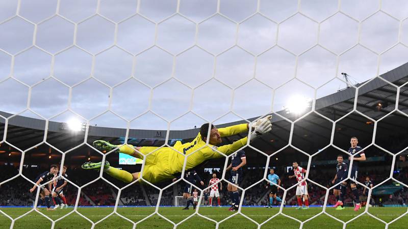 Scotland goalkeeper David Marshall at full stretch as Luka Modric scores for Croatia. Getty Images