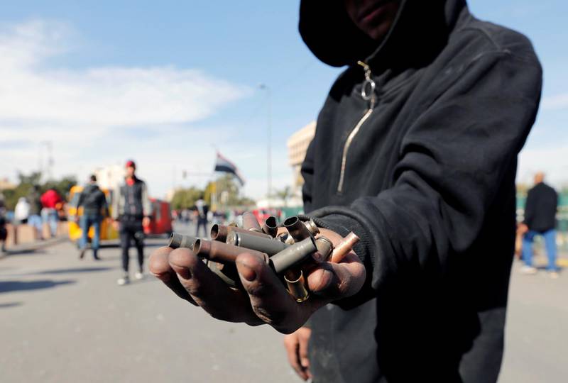 An Iraqi demonstrator shows the casings from bullets which were allegedly used by the Iraqi security forces, during the ongoing anti-government protests in Baghdad. REUTERS