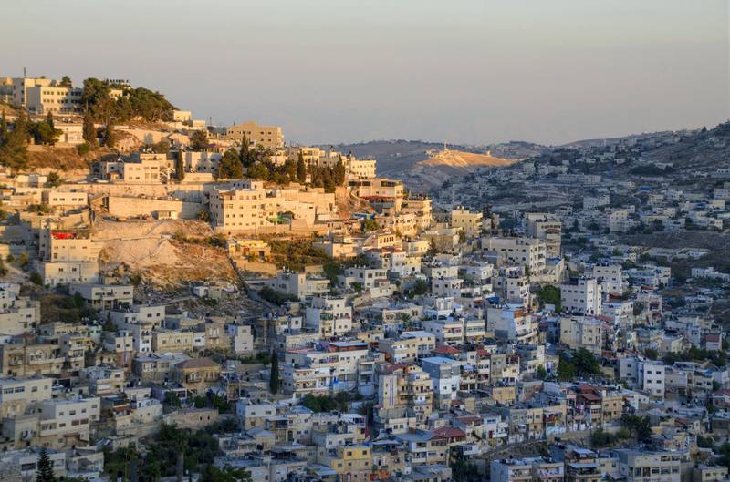 The last sunlight of the day hitting the top of Silwan, a suburb of Jerusalem. Silwan, known in Jesus' day as Siloam, was the site of several healing miracles.