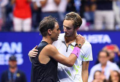 Rafael Nadal of Spain embraces his opponent Daniil Medvedev after the match. AFP