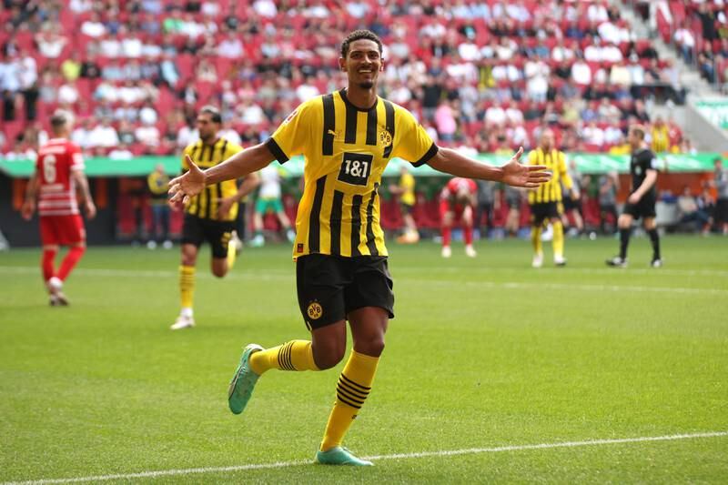 Sebastien Haller of Borussia Dortmund celebrates after scoring the team's second goal during a 2-0 Bundesliga win over Augsburg at WWK-Arena on May 21, 2023 in Augsburg, Germany. Getty Images