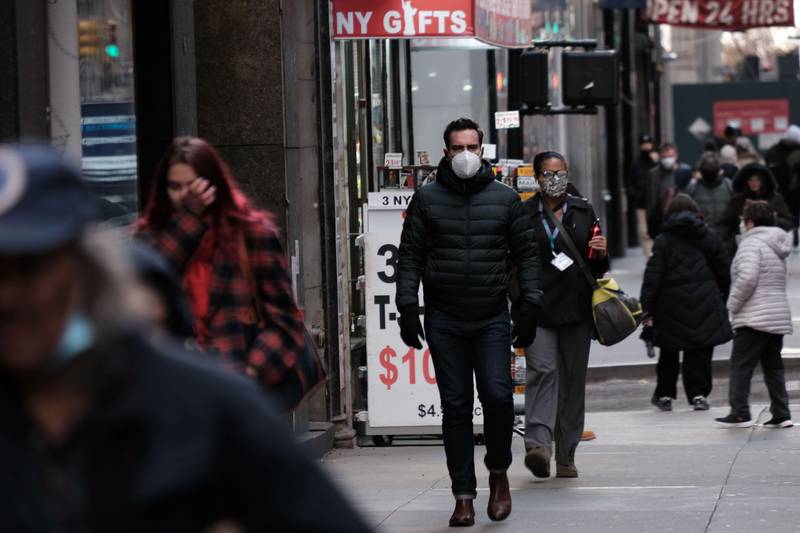 People wearing face masks in Manhattan. New York's governor has declared a state of emergency due to the risk of a surge of Covid-19 cases as winter sets in. AFP
