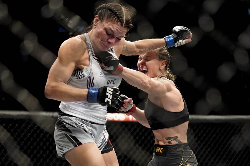 Valentina Shevchenko, right, throws a punch against Lauren Murphy. AP Photo