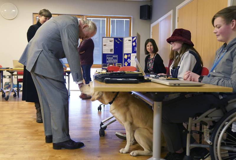 King Charles meets guide dog Bobby at Royal National College for the Blind in Hereford. AP