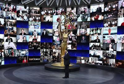 Jimmy Kimmel stands in front of a wall of nominees watching remotely at the Staples Center during the 72nd Primetime Emmy Awards ceremony held. AFP