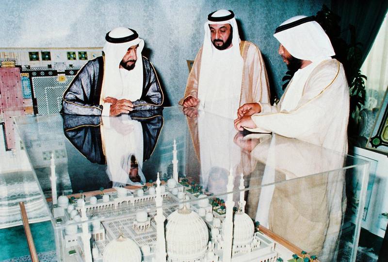 An image from the Itihad archive. Courtesy Al Itihad. Abu Dhabi, UAE. Sheikh Zayed inspecting the plan of the Sheikh Zayed Mosque with his sons Sheikh Khalifa and Sheikh Sultan.