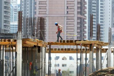 DUBAI, UNITED ARAB EMIRATES , June 11 – 2020 :- Workers at one of the construction site in Al Satwa area in Dubai.  The UAE’s compulsory midday break for outdoor workers will start from June 15. (Pawan Singh / The National) For News/Standalone/Online/Stock