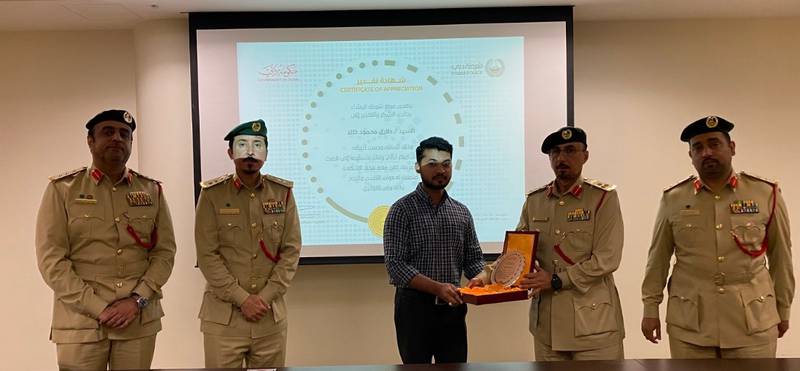 Tariq Mahmood was honoured by police after handing in Dh1 million in cash he found. Photo: Dubai Police