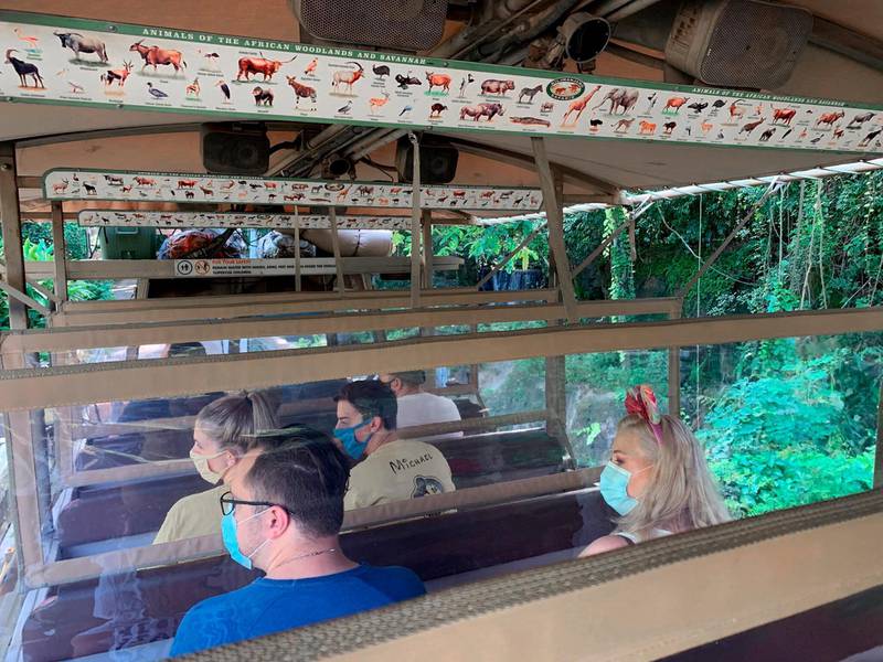 Disney annual passholders get a peek at the coronavirus-inspired changes such as plastic dividers on the Kilimanjaro Safari ride at Disney's Animal Kingdom. AP