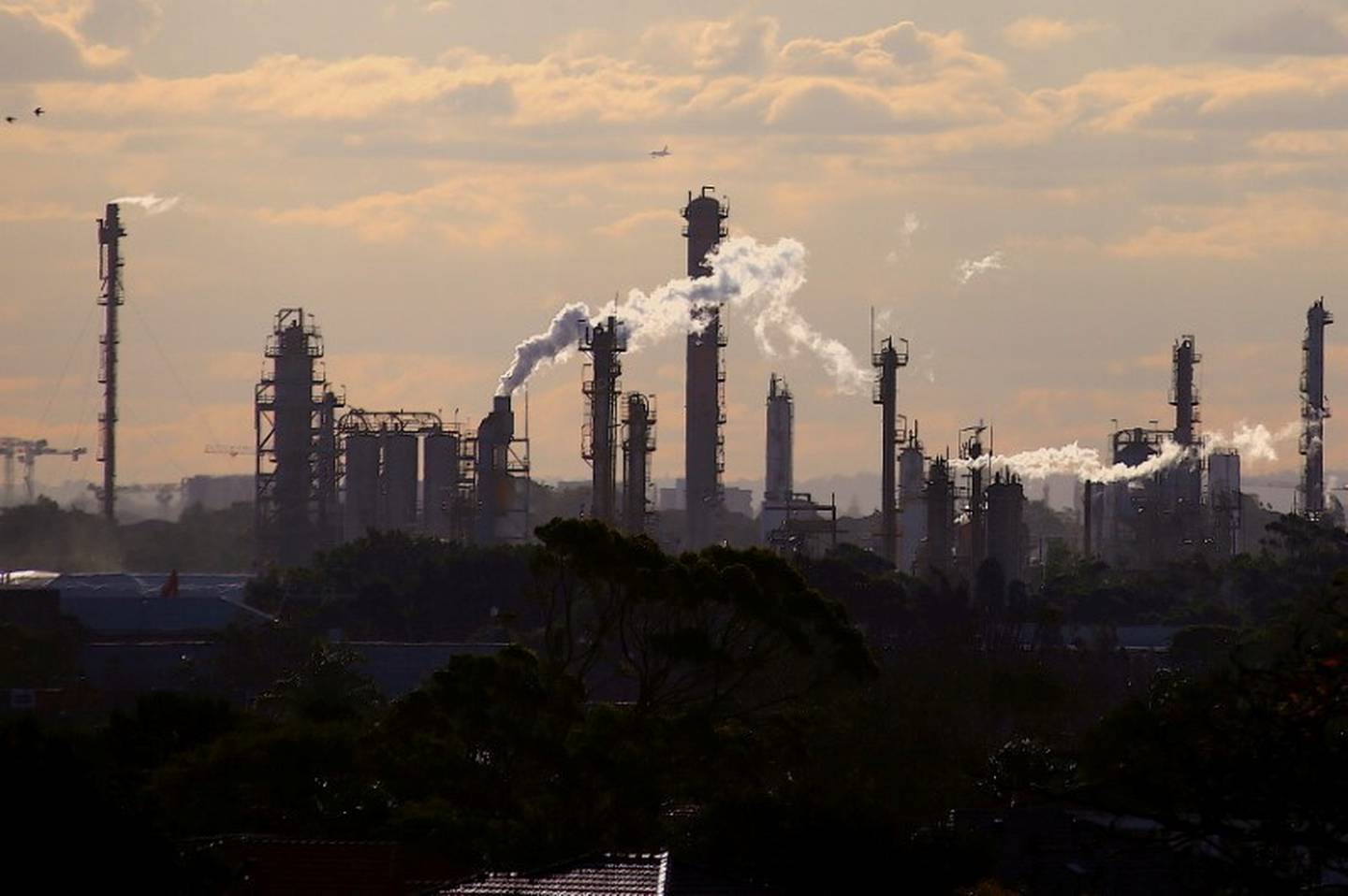 Emissions from a chemical plant in Sydney, Australia. Climate change is the biggest challenge facing central banks and financial institutions. Reuters 